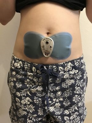 バタフライアブスをお腹に貼り付けた写真